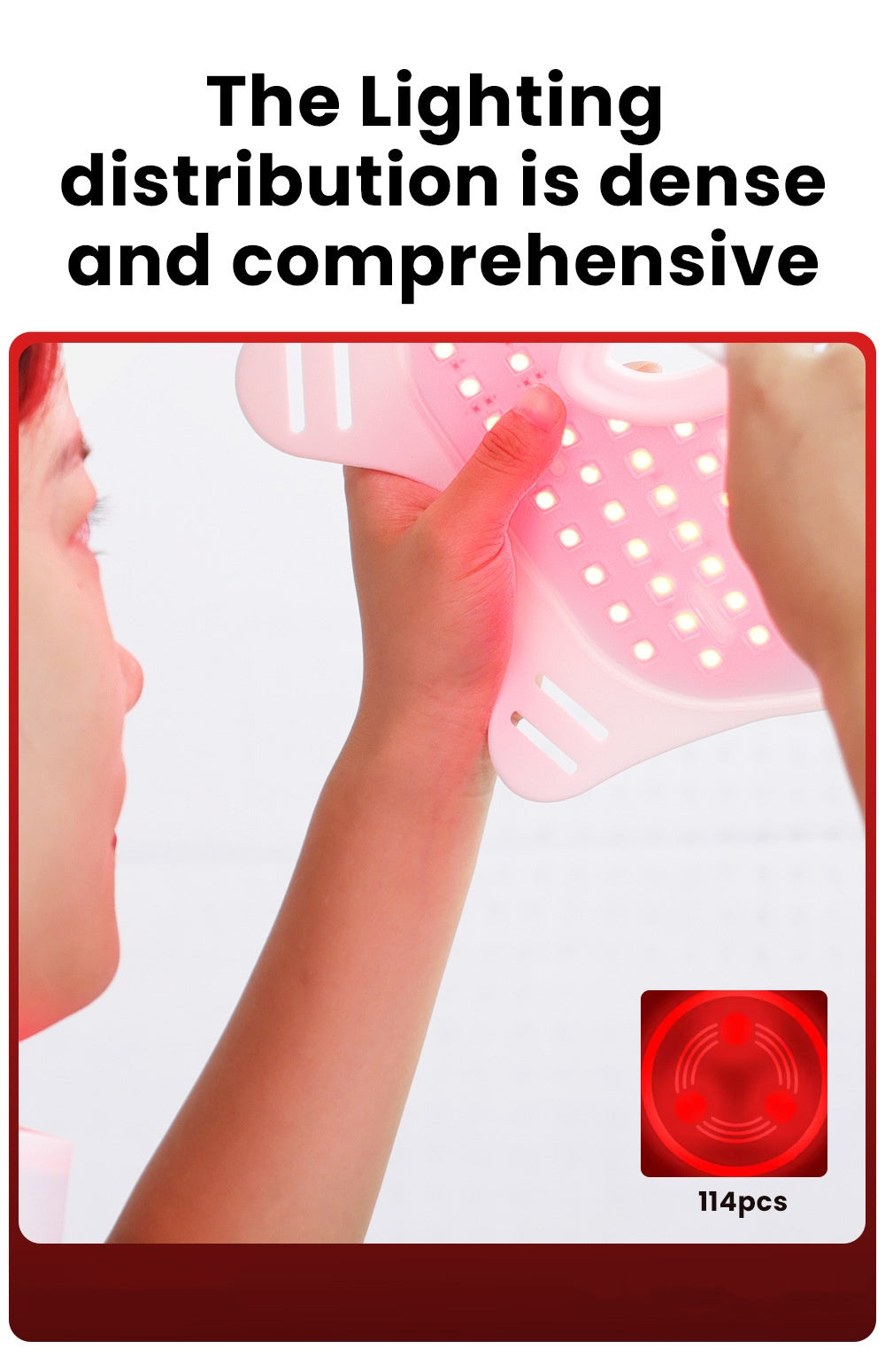Person holding a pink LED light therapy device with 114 dense red lights for skincare treatment